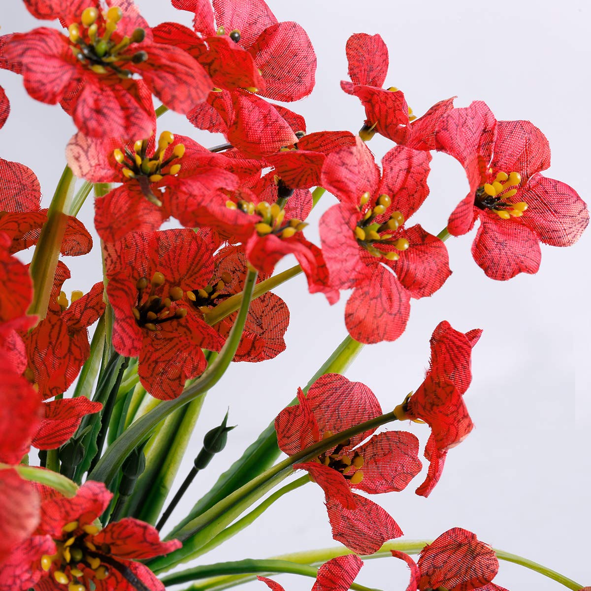 JEMONG no-fade faux flowers maintain color without watering or pruning.