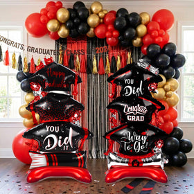 Jenaai self-standing foiled balloon two-pack creates a bold graduation centerpiece.