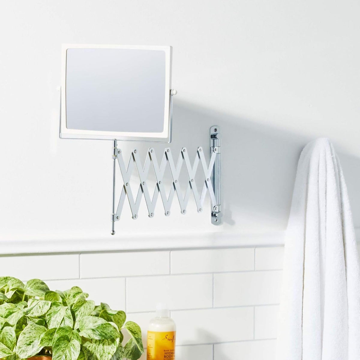JERDON swivel mirror offers 360-degree rotation for flexible makeup routines.
