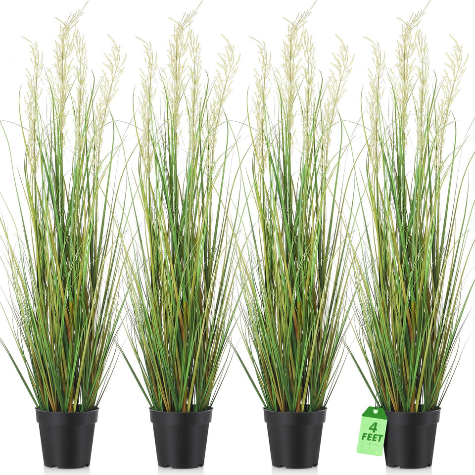 Jexine four-foot tall artificial grass plant in a black pot for instant greenery.