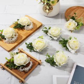 Homecoming or prom decor with Jexine ivory roses wrist corsages