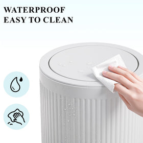 JiatuA compact kitchen trash bin saves space while remaining easy to reach