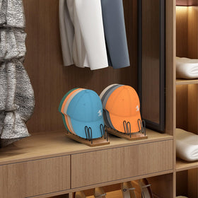 JigJag walnut color hat rack adds warm decor to room.
