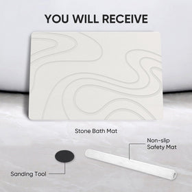 Jiloma stone bath mat demonstrates versatile use in bathroom, kitchen, or entryway.