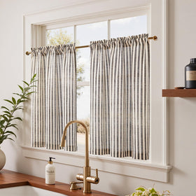 Jinchan jet-black light-filtering curtains provide privacy while brightening spaces
