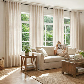 Light-filtering Jinchan curtains shown with a modern window display.