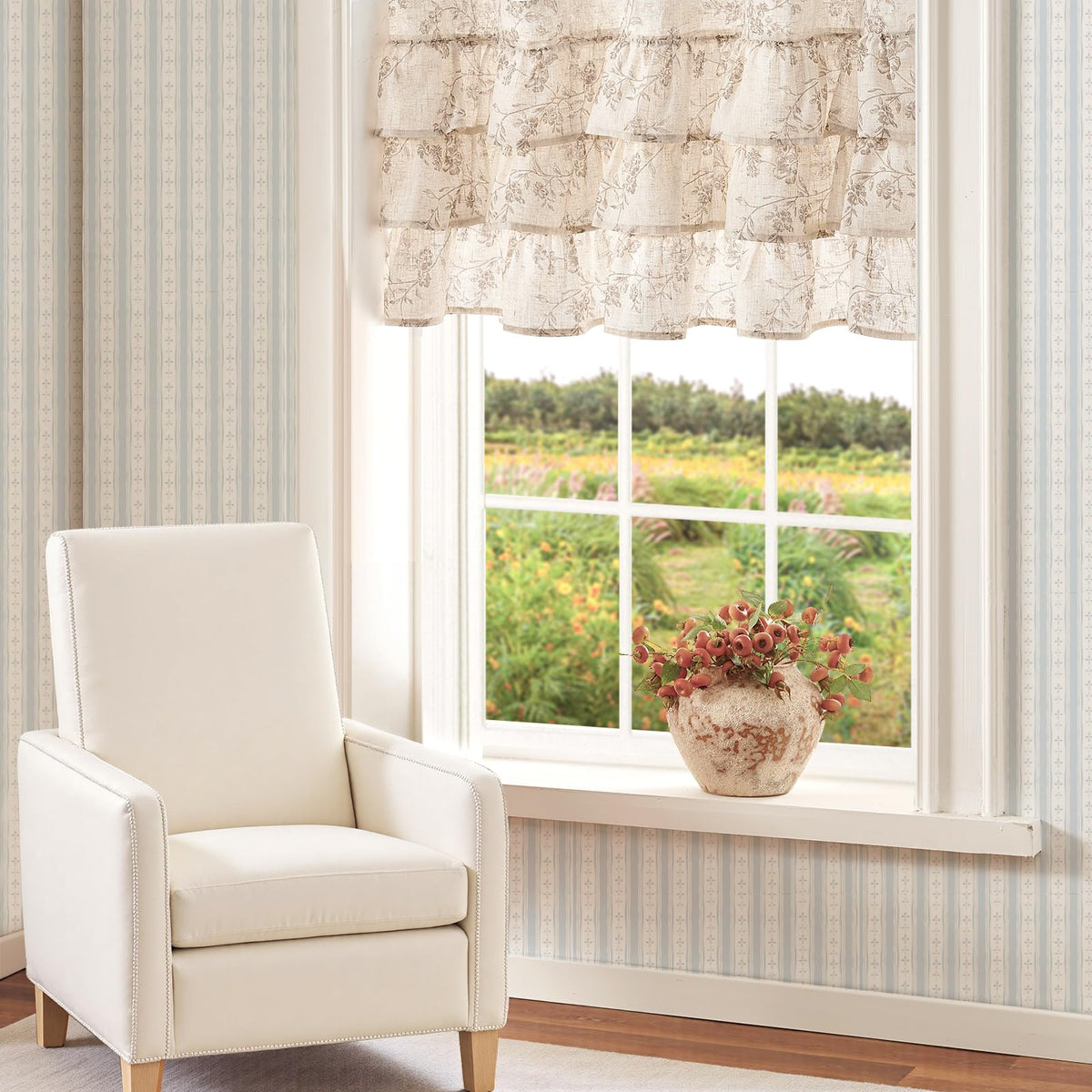 Jinchan light-filtering valance softens daylight with privacy.