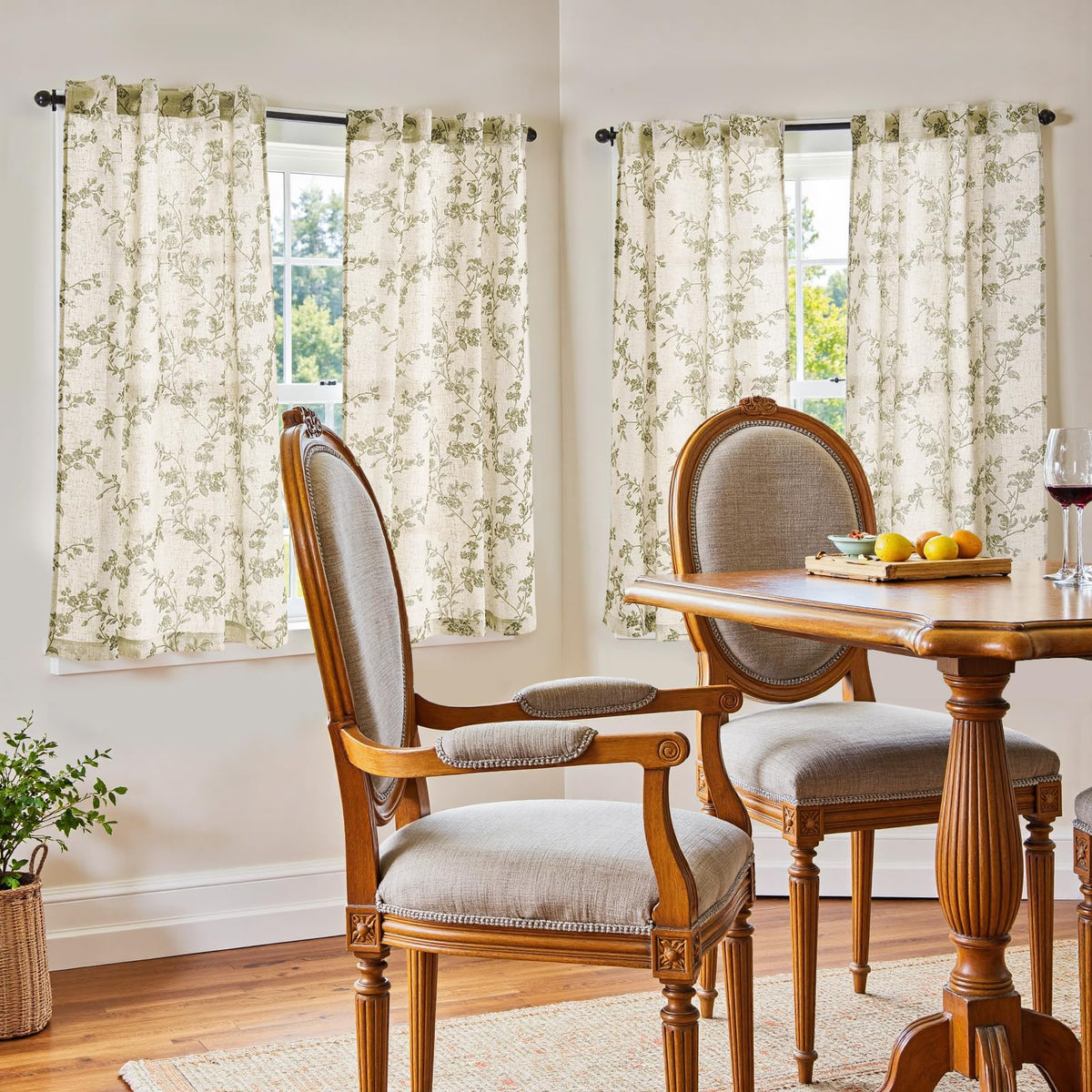 Jinchan sage green on beige fabric close-up shows soft linen texture for cozy spaces.