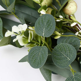 JINGHONG eucalyptus wreath on wall for year-round decor.