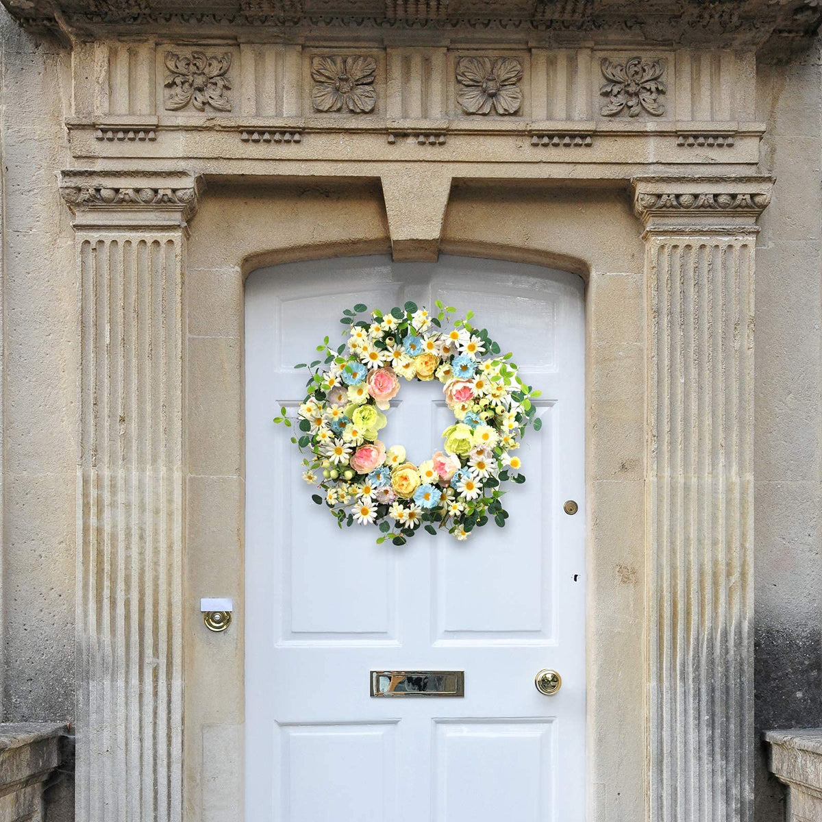 JINGHONG wreath highlights eucalyptus greens and berry clusters