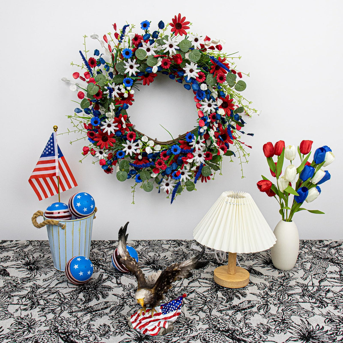 JINGHONG red white blue daisy wreath adds festive entryway charm.
