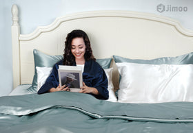 J JIMOO silk pillowcase fabric texture close-up, ultra-smooth feel reduces friction