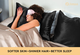 J JIMOO silk pillowcase on black bed for a sleek, luxurious look.