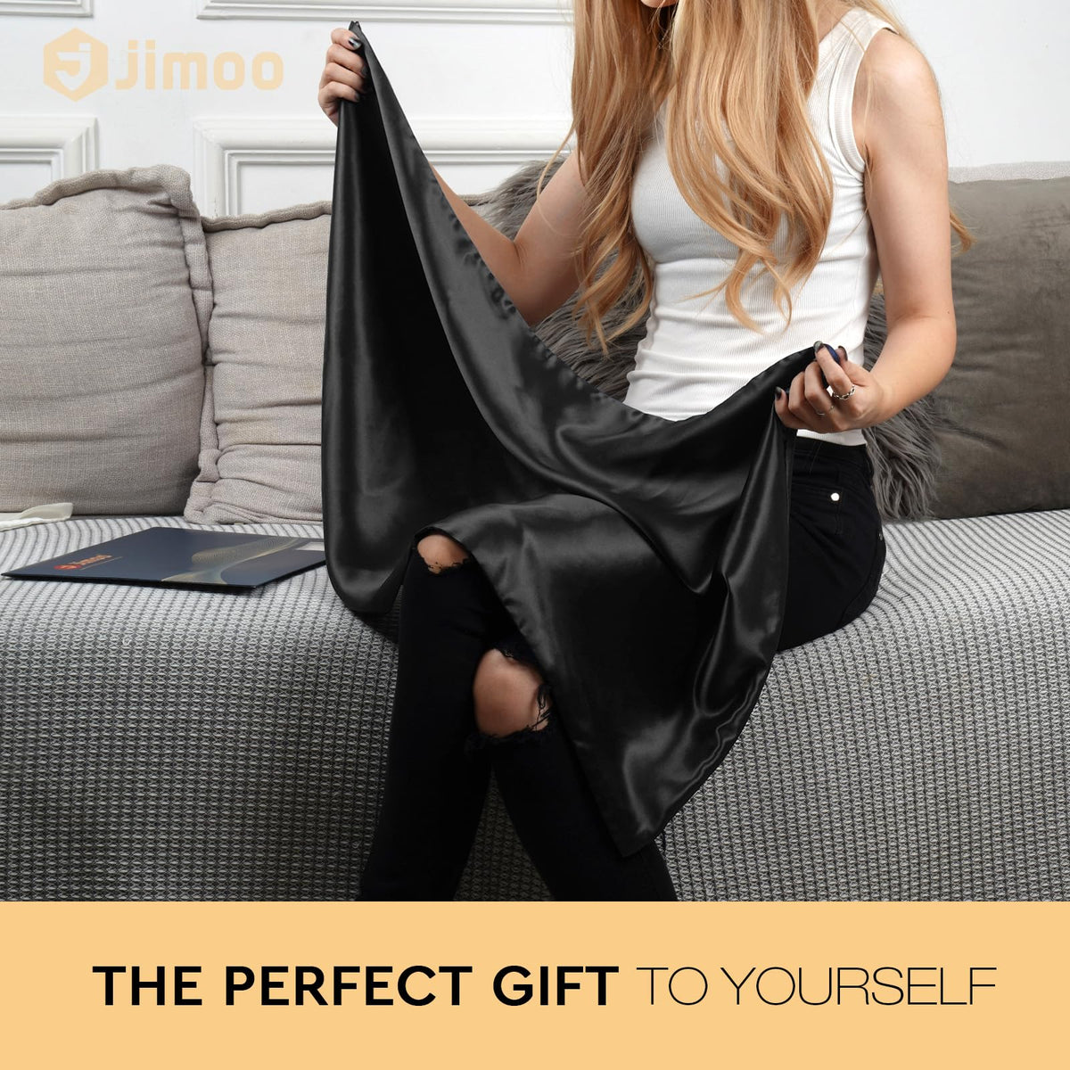 J JIMOO silk pillowcase promotes smooth hair overnight.