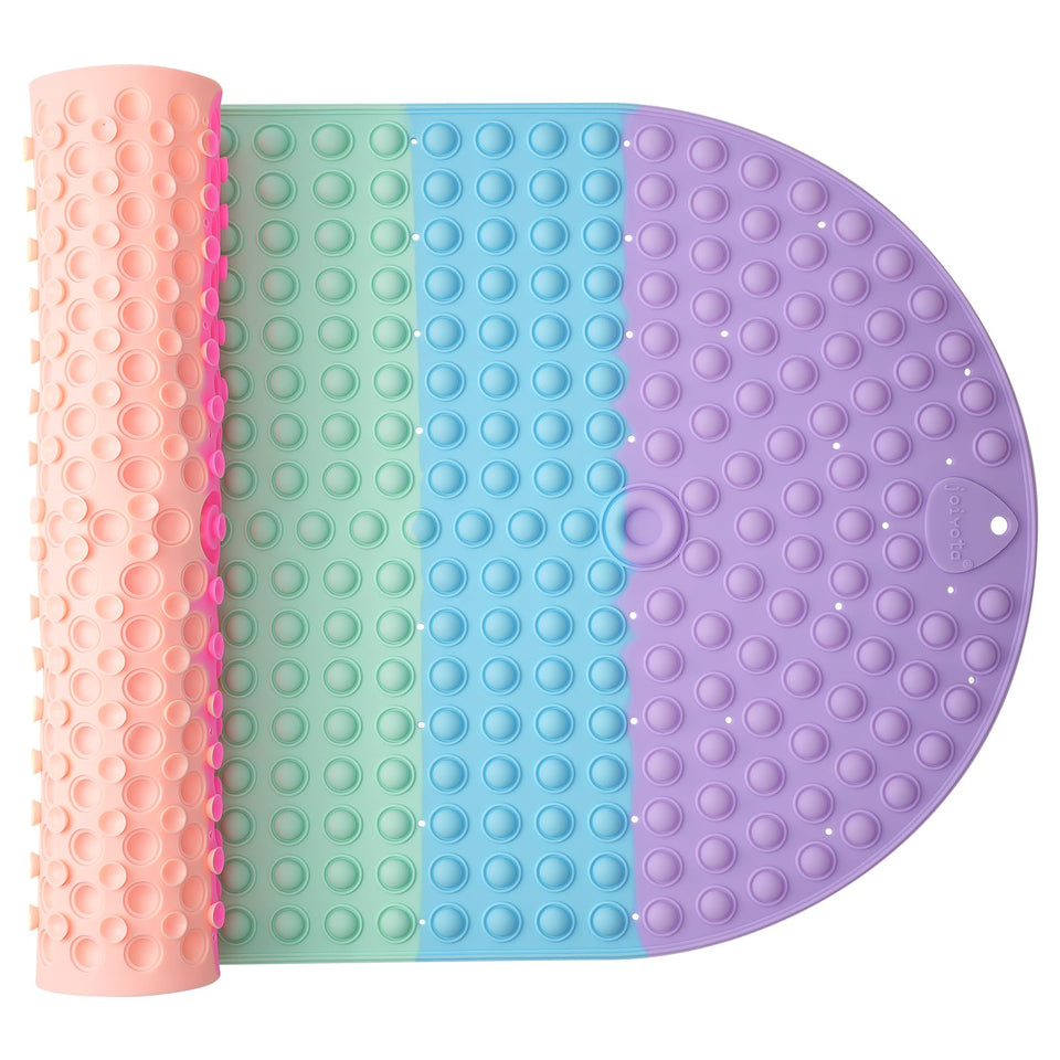 Joiyota rainbow bath mat with suction cups provides secure grip and playful sensory input.