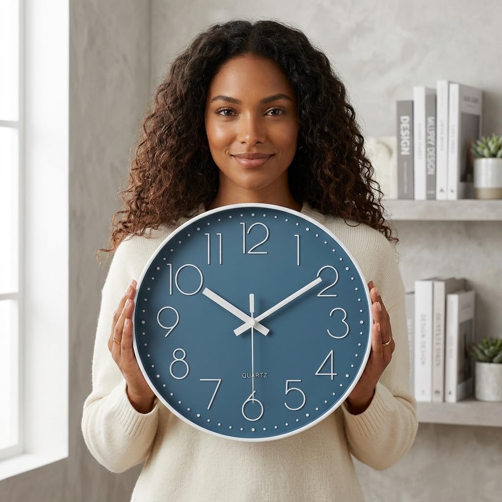jomparis blue wall clock dial closeup shows large white numerals for quick reading.