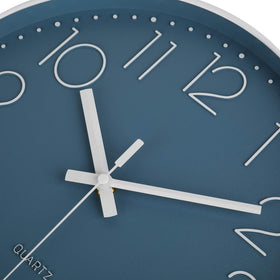 jomparis blue wall clock patio setting highlights indoor-outdoor style.
