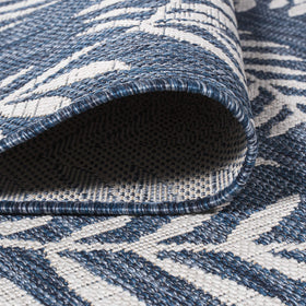 Jonathan Y pet-friendly rug that cleans spills quickly on outdoor surfaces.