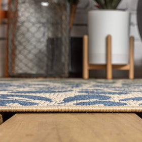 Jonathan Y easy-cleaning rug for quick cleanup after outdoor gatherings.