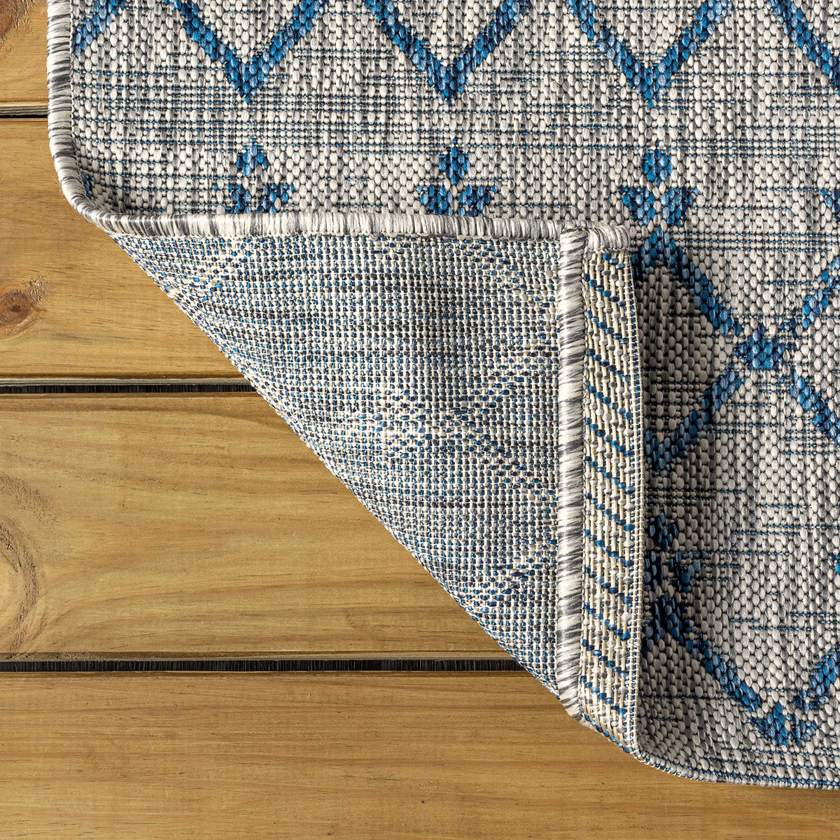 Jonathan Y Ourika flat-weave polypropylene rug for high-traffic areas.