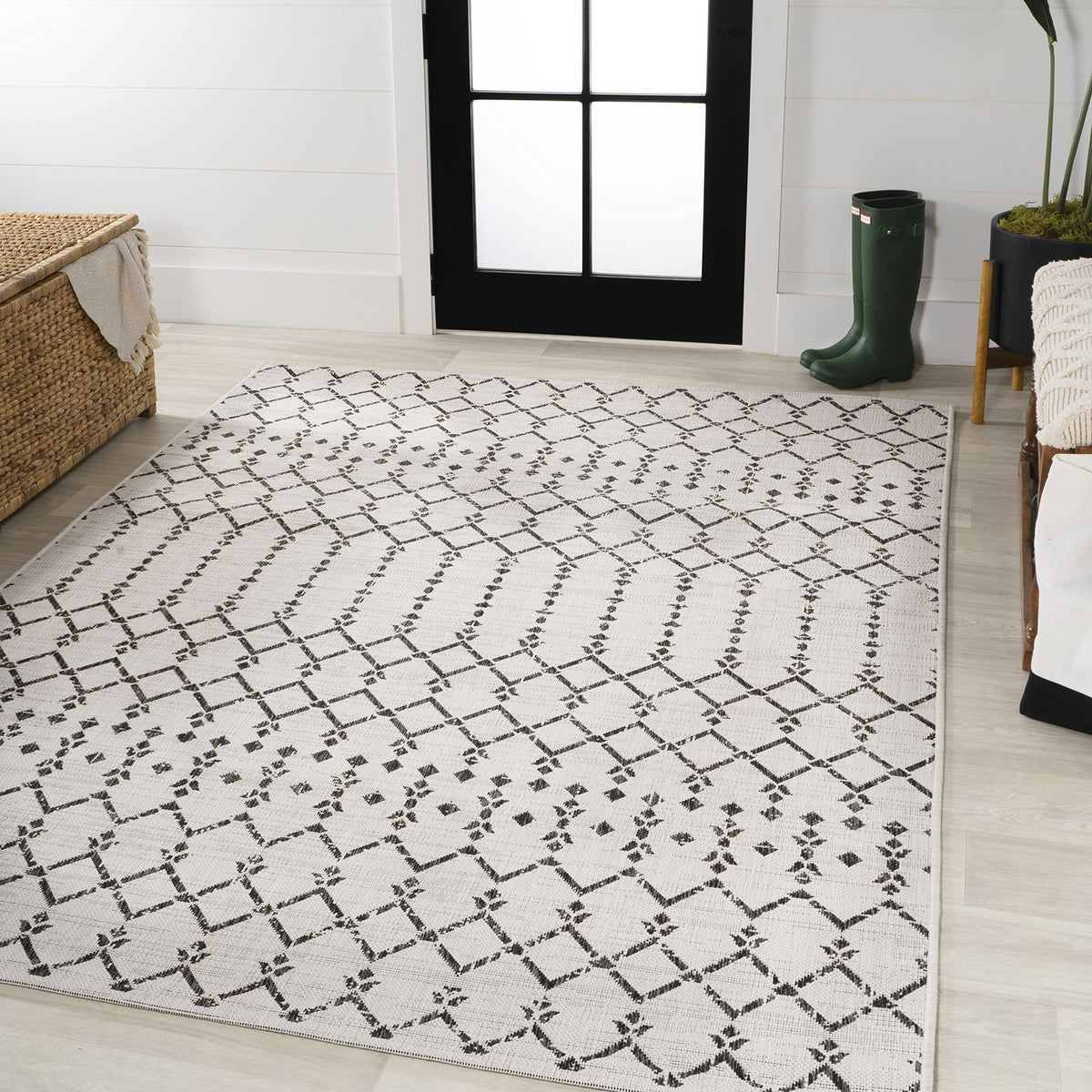 Jonathan Y flat-weave polypropylene construction provides sturdy outdoor performance.