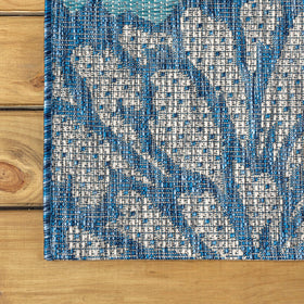 JONATHAN Y low-pile rug highlights durability for busy homes and pets.