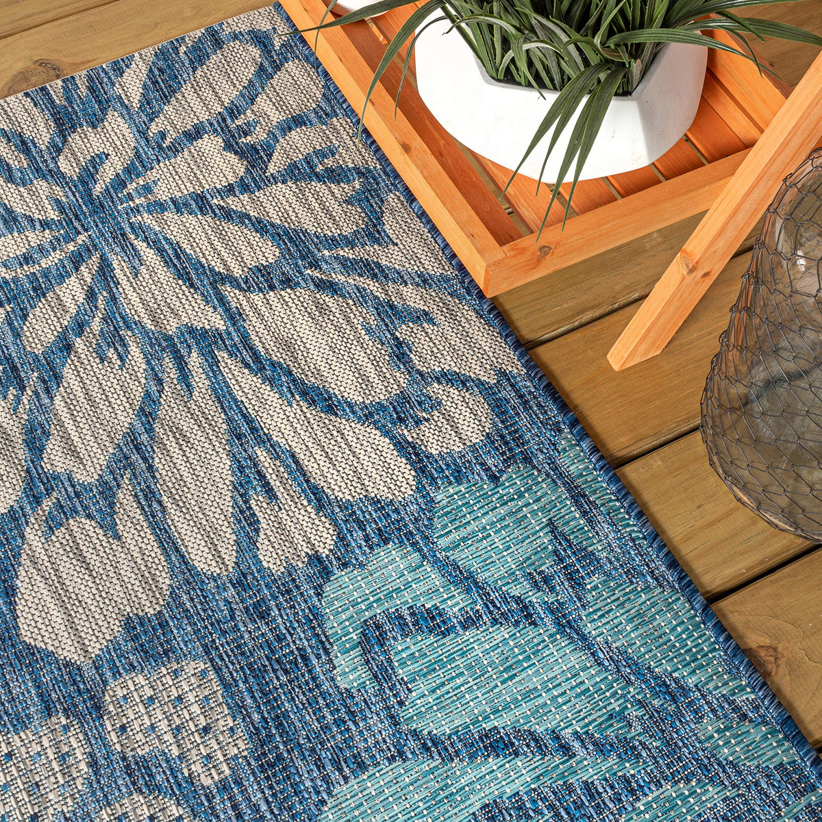 JONATHAN Y navy-aqua flowers closeup; vibrant palette elevates yard or porch decor.