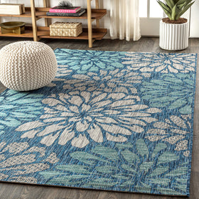 JONATHAN Y outdoor rug in patio scene ready for easy space transformation.