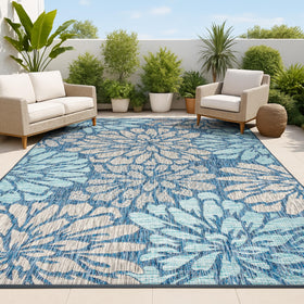 Jonathan Y floral textured weave rug shows navy and aqua blooms for outdoor durability.
