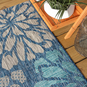 Jonathan Y navy-aqua flowers add visual impact to backyard seating areas.