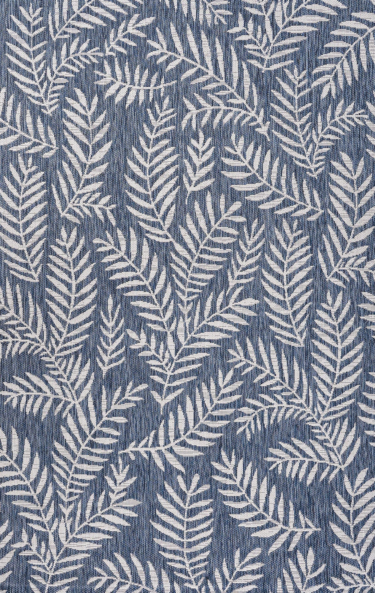 Jonathan Y mingled navy-cream texture adds tropical style to rooms.