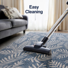 Jonathan Y stain-resistant rug maintains color in sunlit decks.