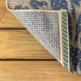 Jonathan Y navy flowers on beige ground brighten any patio and outdoor room.