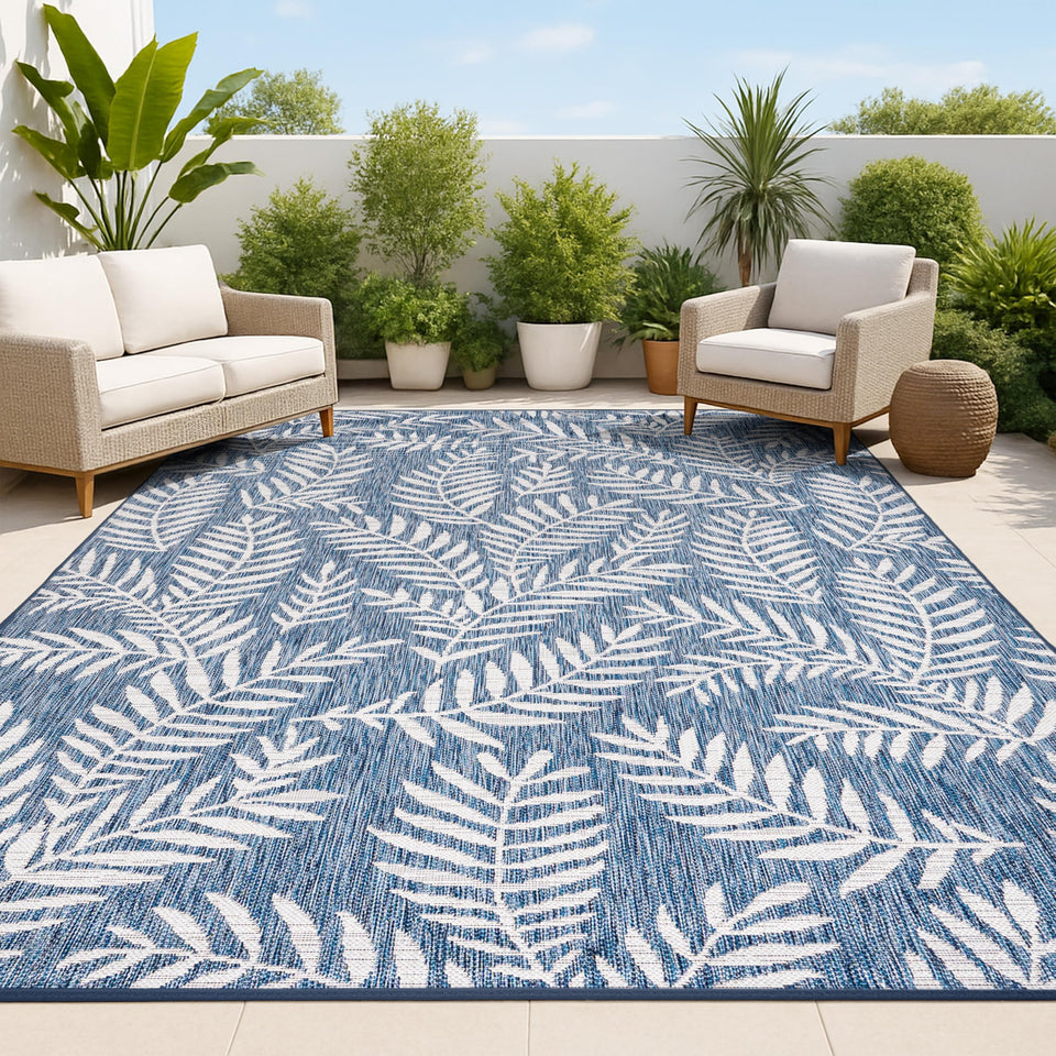 Jonathan Y Palm Frond Rug in navy and ivory for high-traffic outdoor areas.
