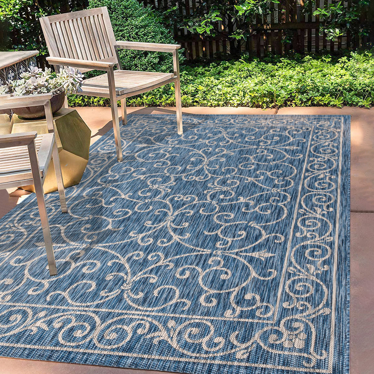 Jonathan Y navy-gray porch rug on steps highlights quick spills cleanup