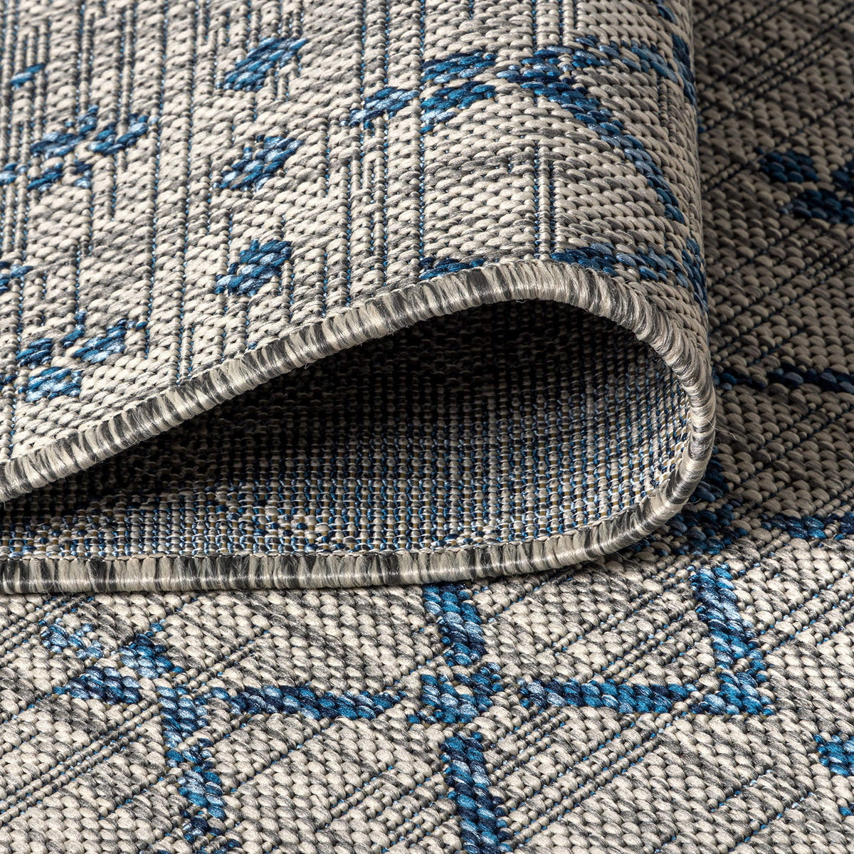 Jonathan Y Ourika pet-friendly outdoor rug resists staining and fading.