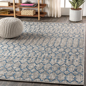 Jonathan Y Ourika textured weave rug adds vintage vibe to outdoor porches.