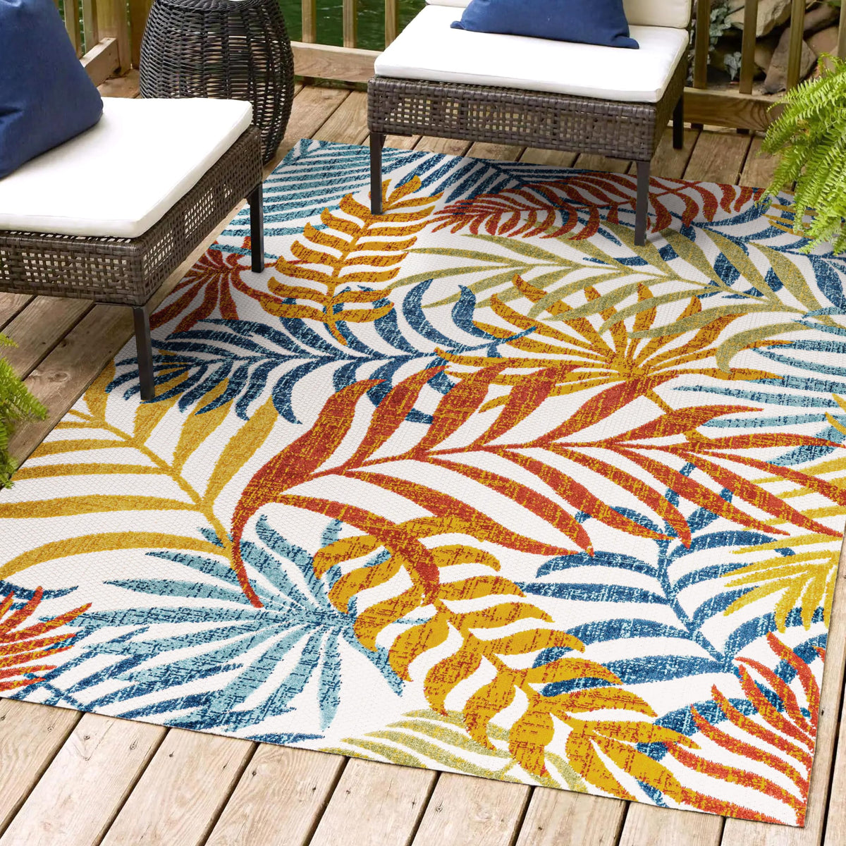 Outdoor-ready Tropics rug on a stylish patio setup for gatherings.