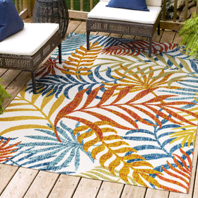 Outdoor-ready Tropics rug on a stylish patio setup for gatherings.