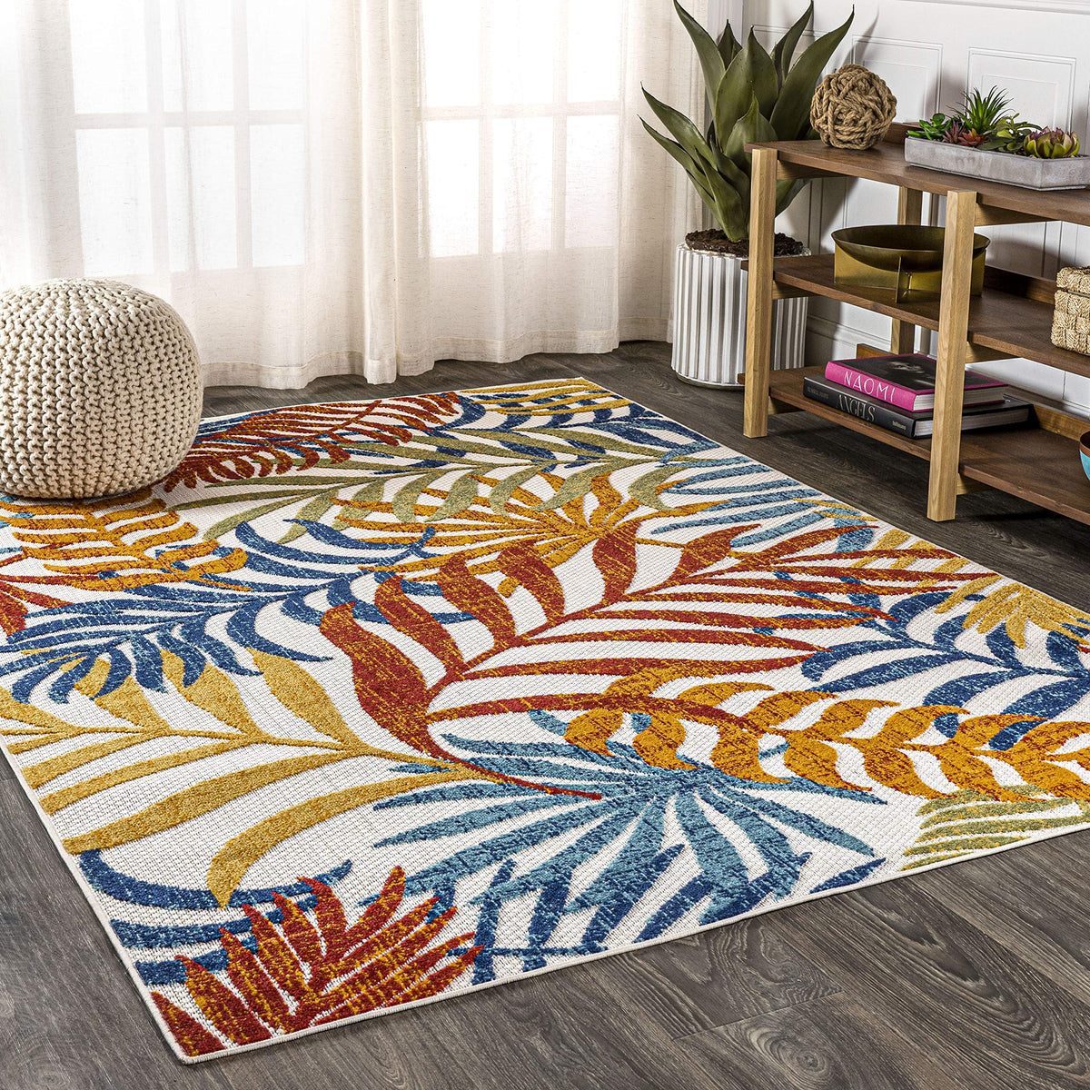 Palm-fronds flatweave design suitable for high-traffic entryways and decks.