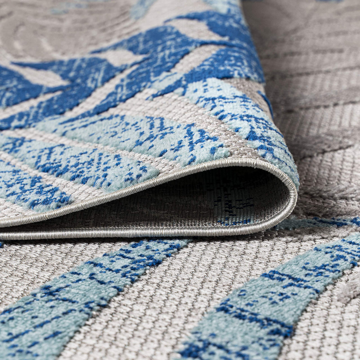 JONATHAN Y Tropics palm leaves rug gray-blue color scheme suitable for various decor