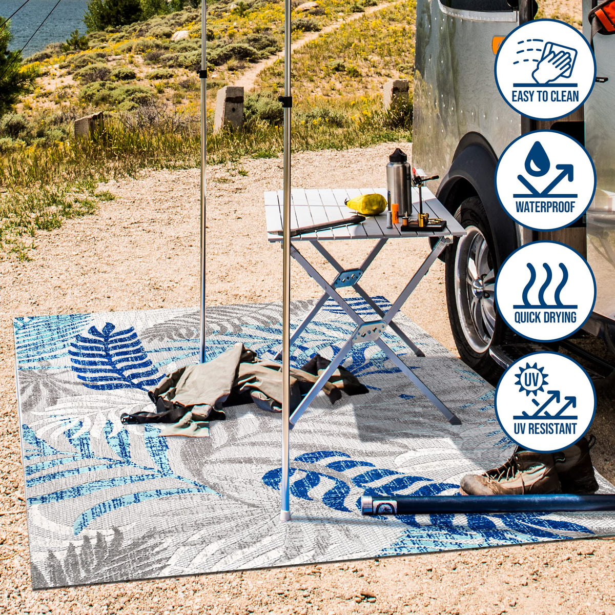 JONATHAN Y Tropics palm leaves rug on deck with easy-care design