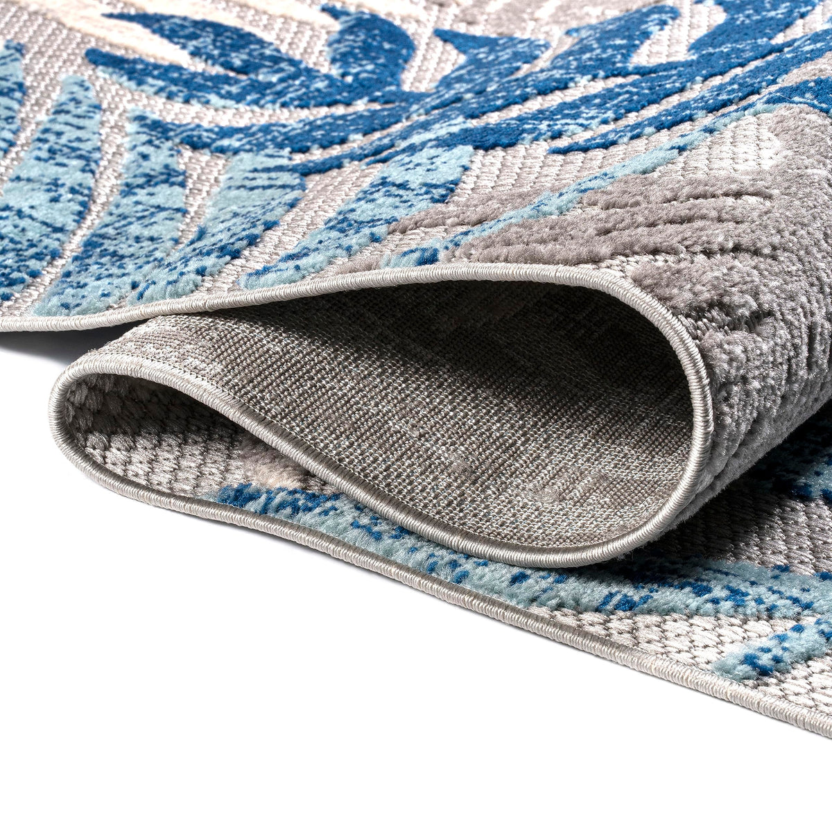 JONATHAN Y Tropics palm leaves rug showcasING pet-friendly design for homes