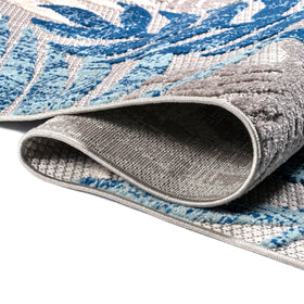 JONATHAN Y Tropics palm leaves rug showcasING pet-friendly design for homes