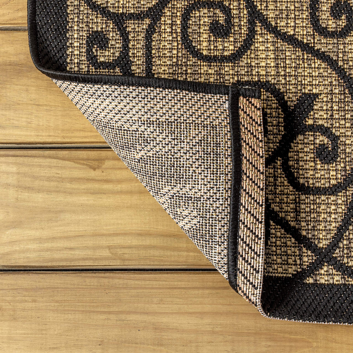 JONATHAN Y outdoor rug offers stain resistance and pet-friendly design