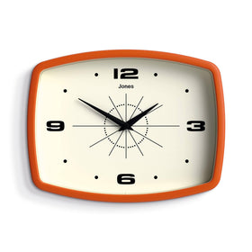 Jones Clocks Movie clock front view, retro orange design for kitchen decor.