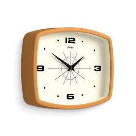 Jones Clocks mustard yellow clock face brightens kitchens and living rooms.