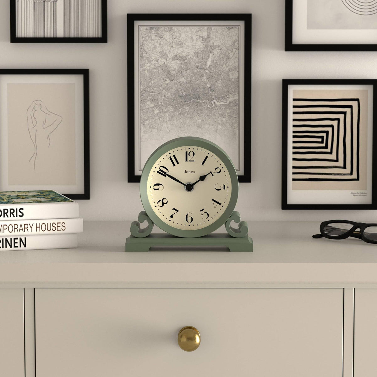 Jones Clocks Saloon clock arabic dial under glass lens for clear time reading.