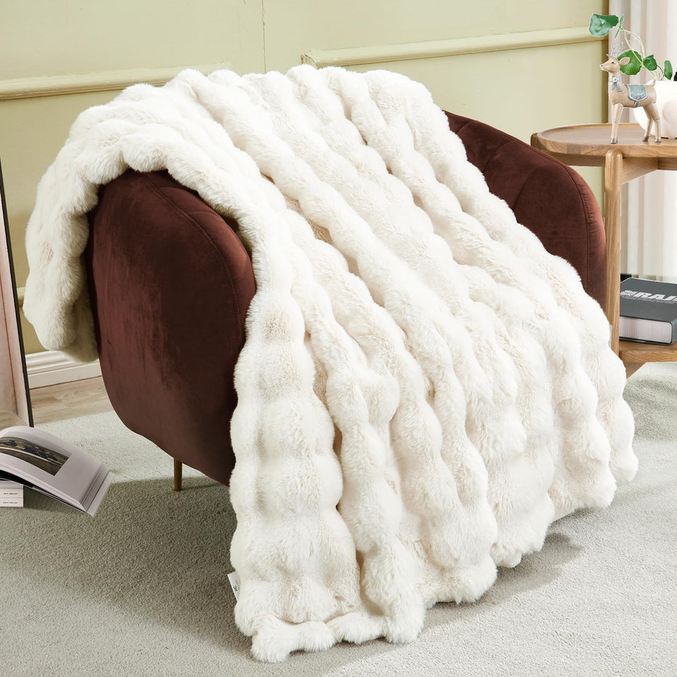 JONIYEAR soft fuzzy bubble throw blanket 50x60 for cozy warmth on the sofa.