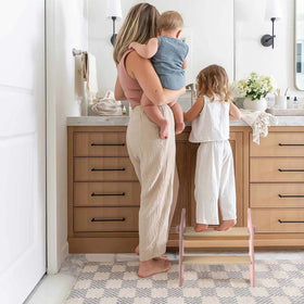 Joothlin wooden 2-step stool pink compact design for small spaces.